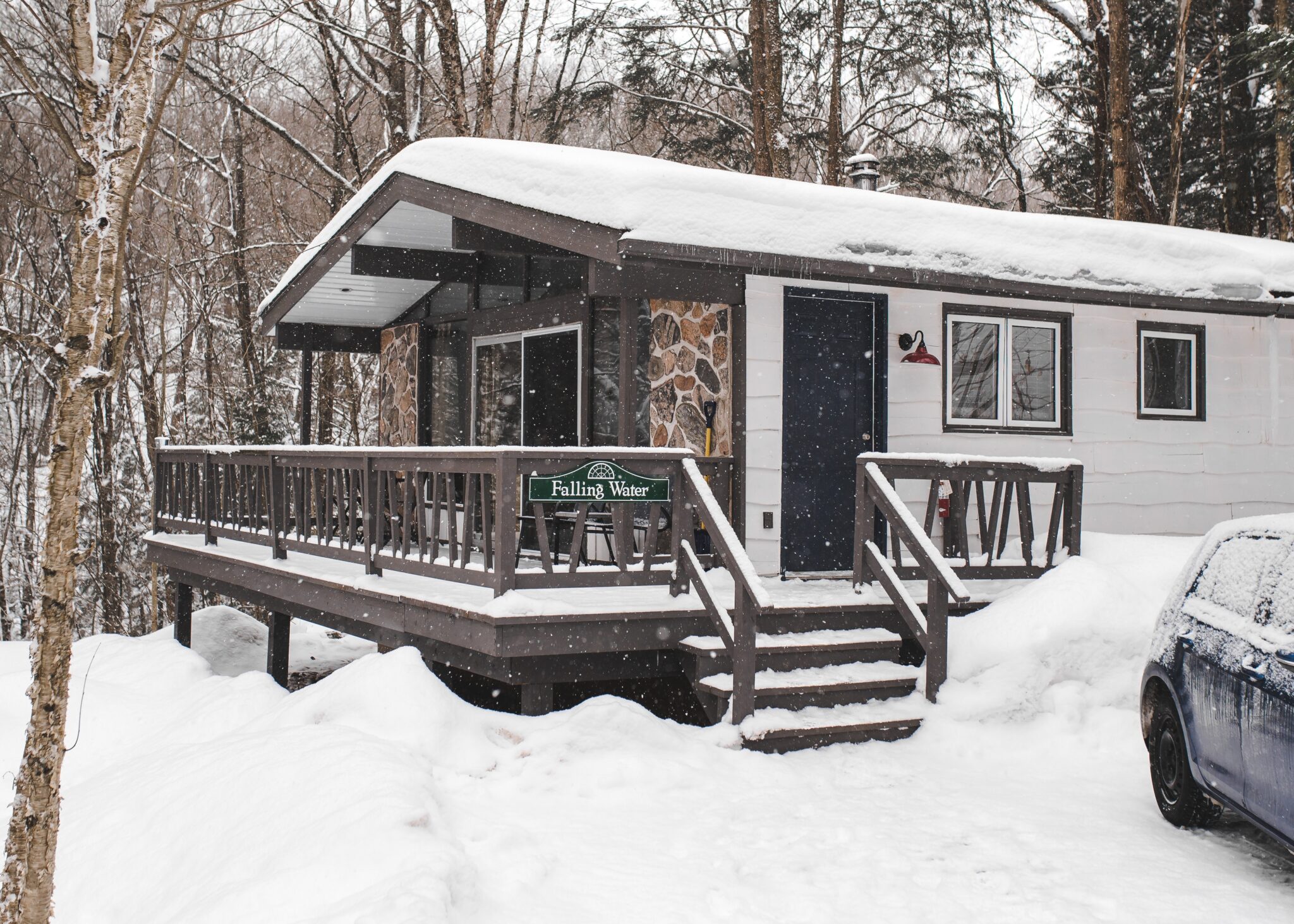 Falling Water spa blanketed in heavy snow in winter forest setting at Trillium Resort and Spa Muskoka Huntsville Port Sydney
