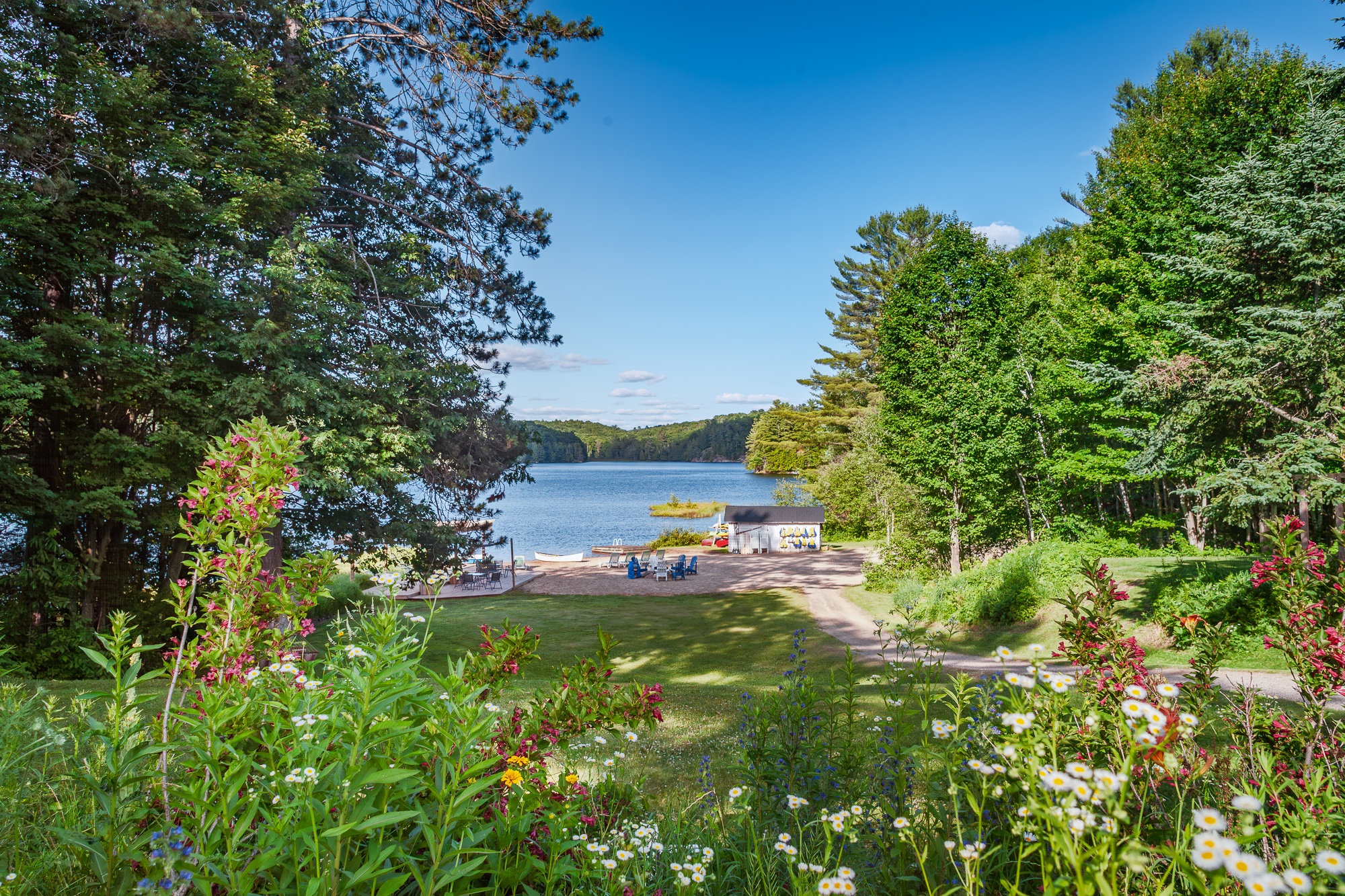 Private Muskoka beach water sports equipment overlooking scenic Muskoka lake at Trillium Resort and Spa Hotel Port Sydney Huntsville
